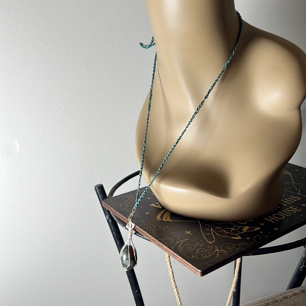 #7 Dragons blood stone Egg Necklace wire wrapped in silvertone with green cord